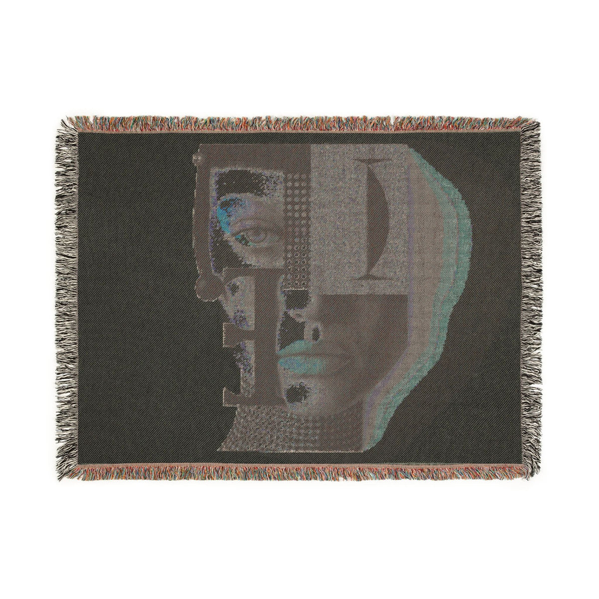 PURETE woven cotton throw blanket featuring a dark abstract portrait design with geometric shapes and fringed edges.