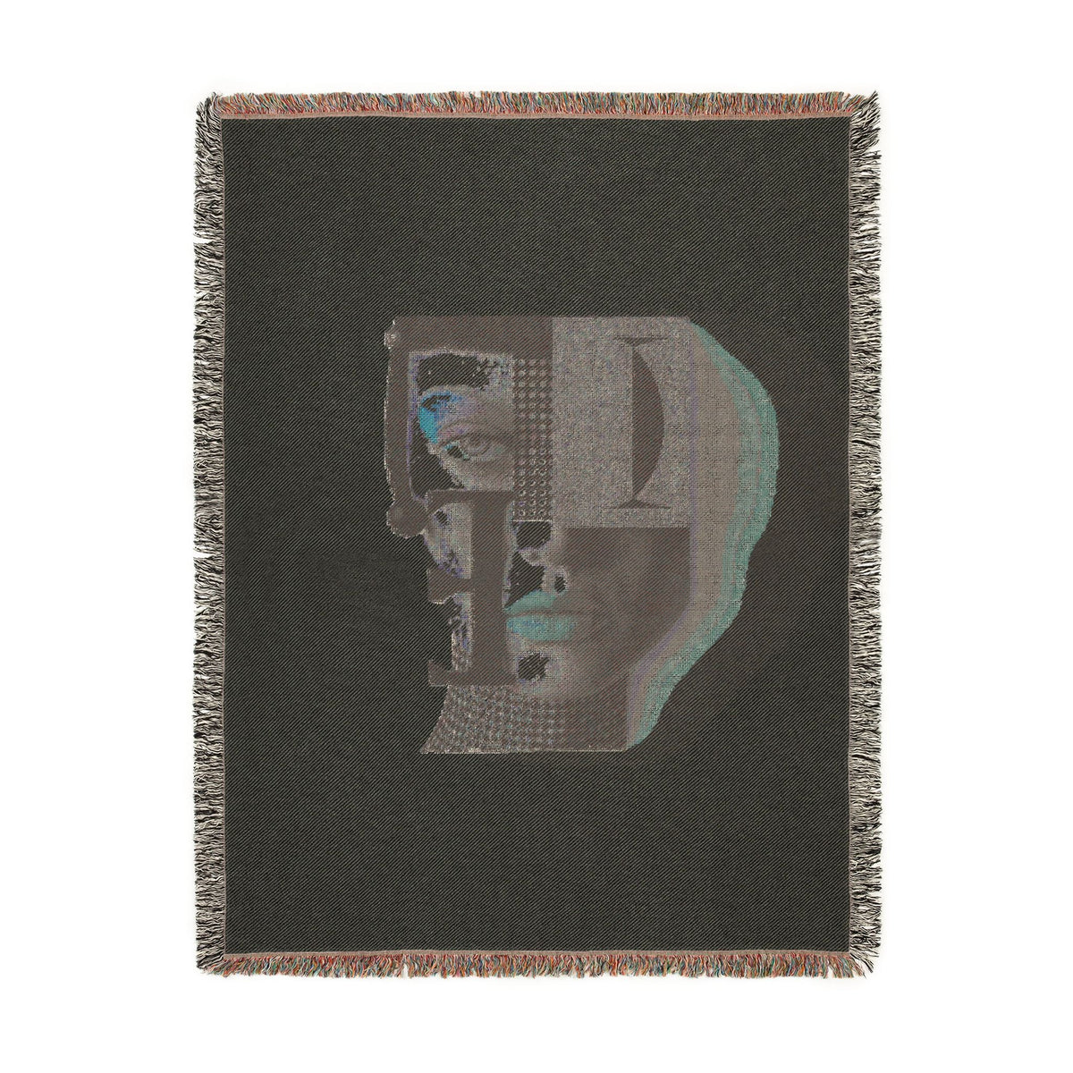 PURETE woven cotton throw blanket featuring a dark grey abstract portrait design with vibrant blue and geometric accents