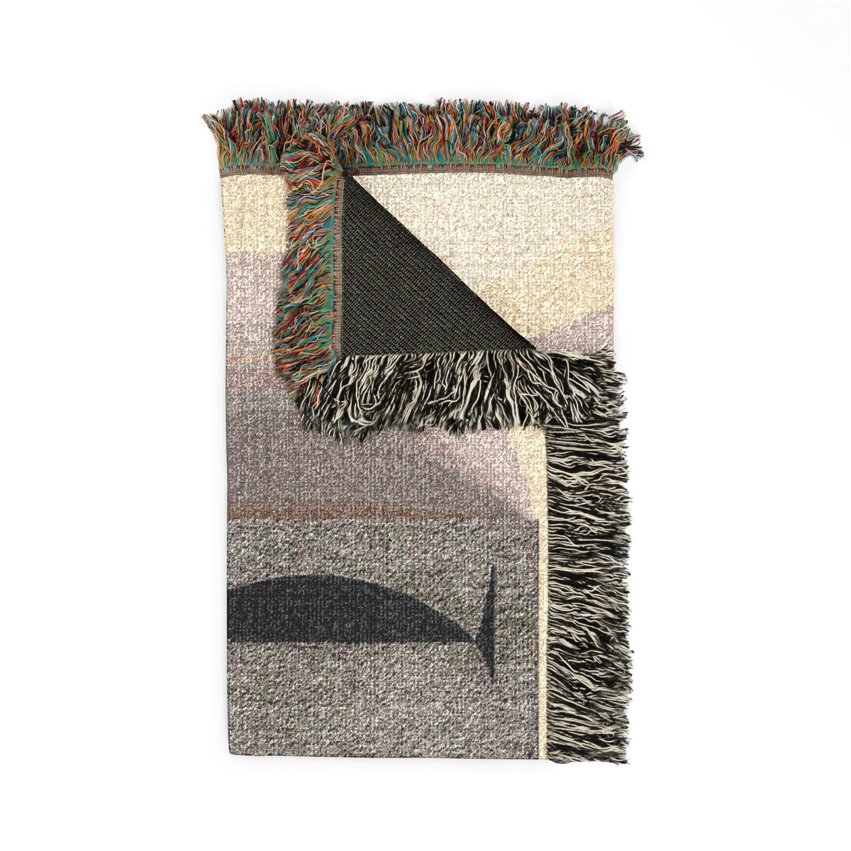 PURETE woven cotton throw blanket featuring an abstract portrait design with vibrant fringed edges on a white background