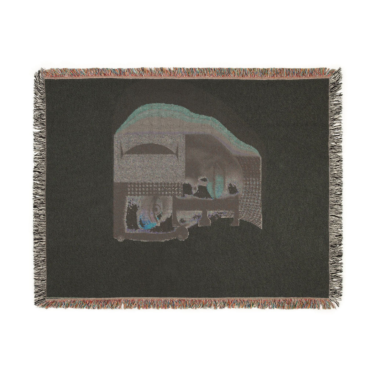 PURETE woven cotton throw blanket featuring a dark abstract portrait design with geometric shapes and fringed edges