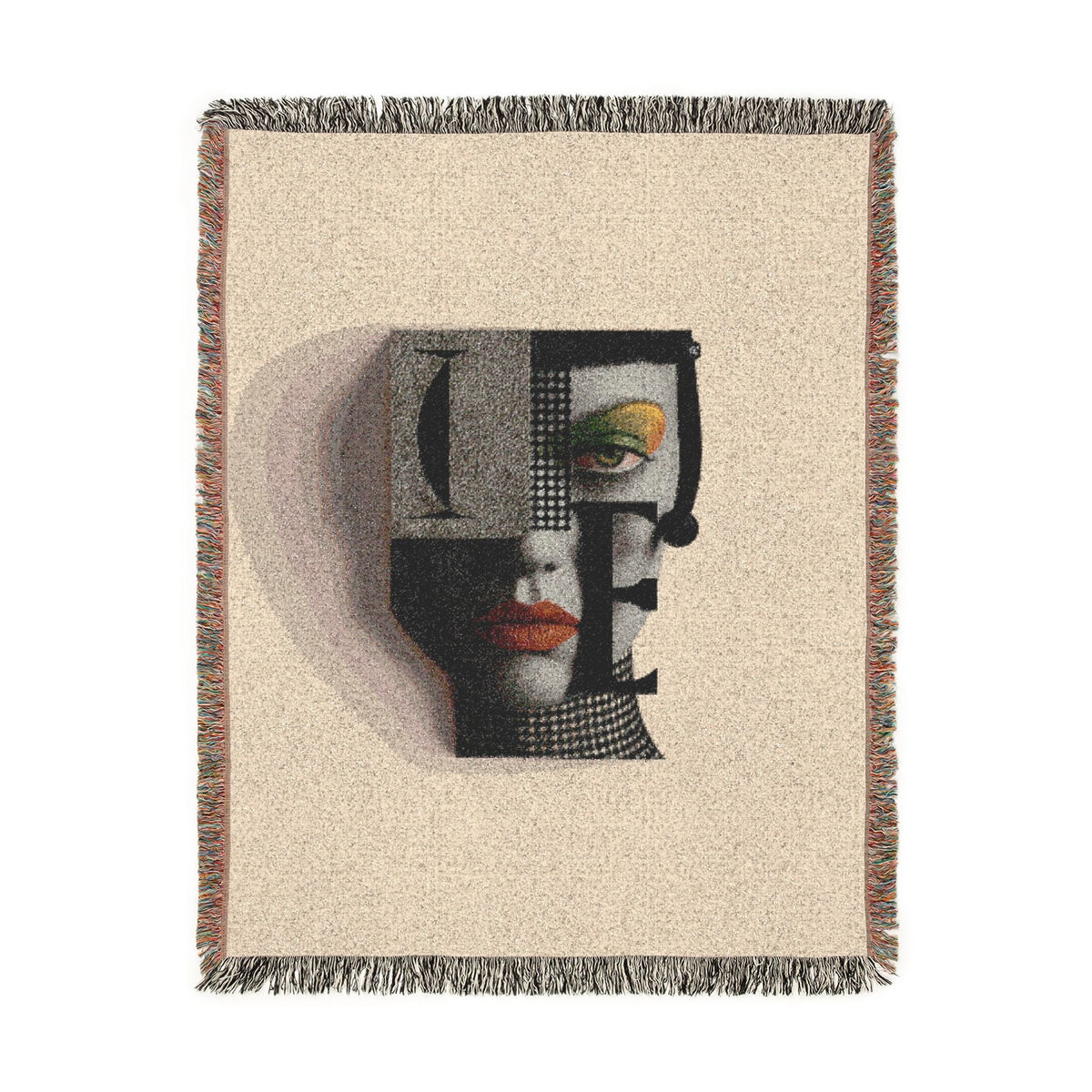 PURETE woven cotton throw blanket featuring a modern abstract portrait design with vibrant accents and fringed edges.