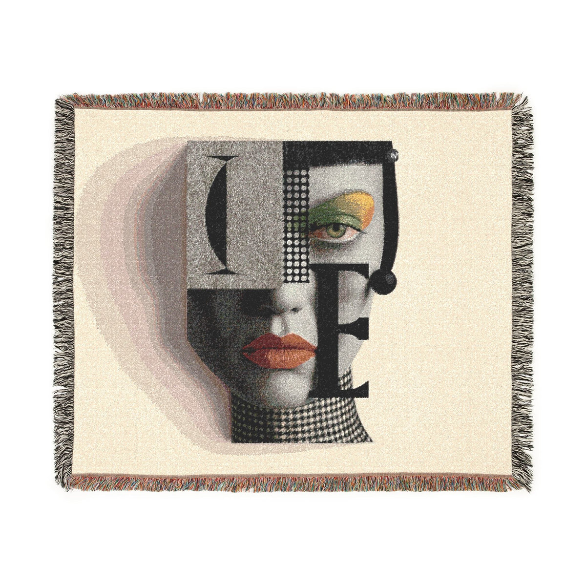 PURETE woven cotton throw blanket featuring a bold abstract portrait with geometric shapes and fringed edges