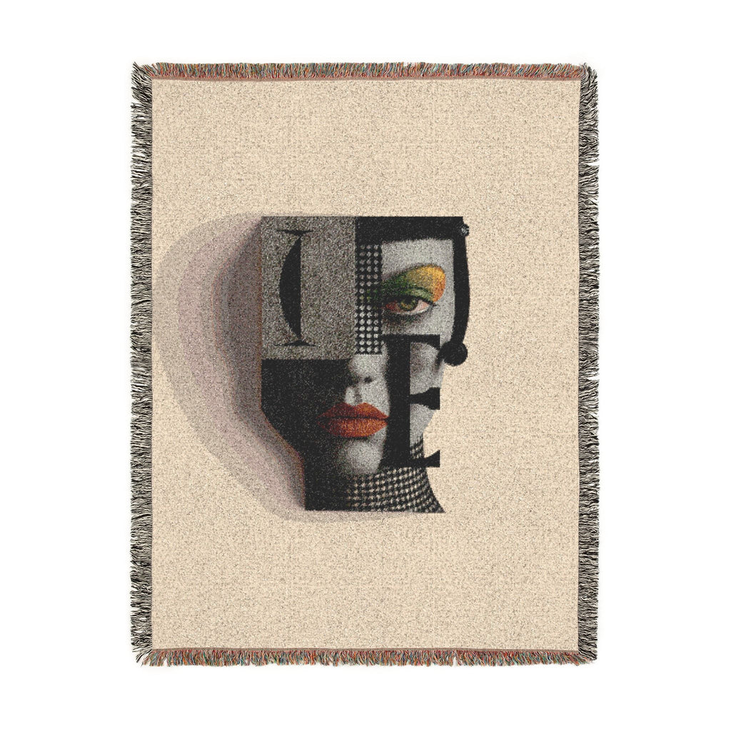 PURETE woven cotton throw blanket featuring a modern abstract portrait design with fringed edges on a cream background.