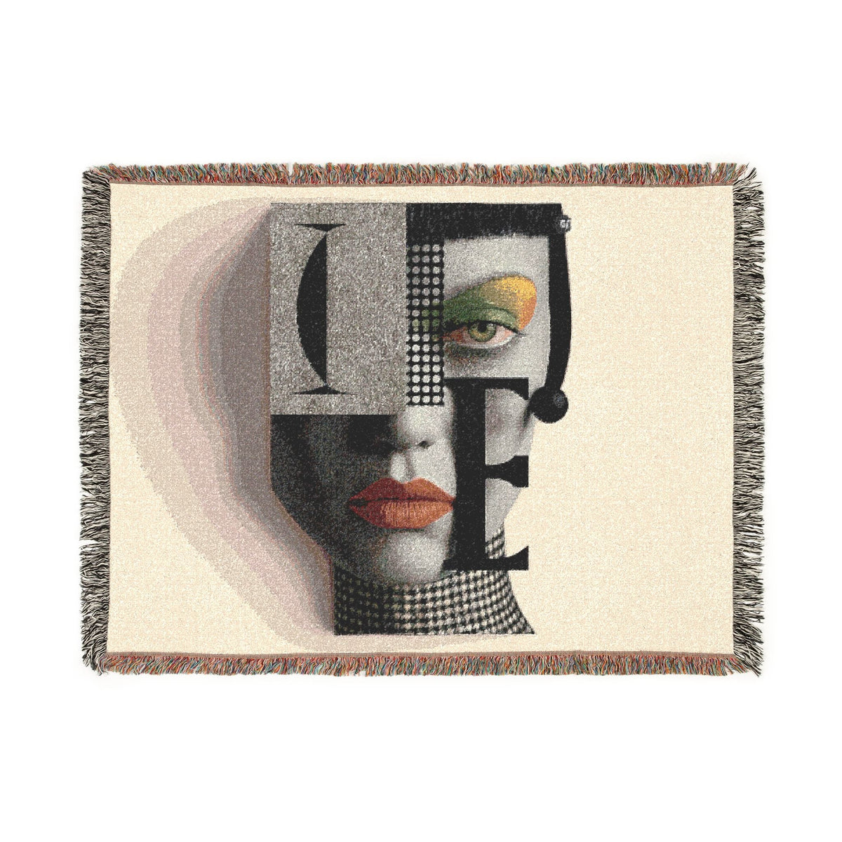 PURETE woven cotton throw blanket featuring a bold abstract portrait design with geometric shapes and fringed edges.
