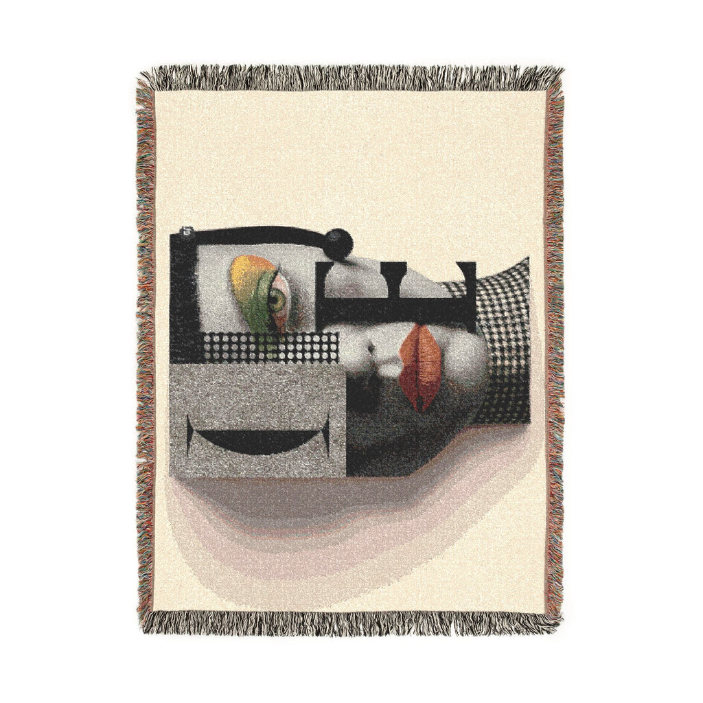 PURETE woven cotton throw blanket featuring a modern abstract portrait design with vibrant geometric accents and fringe