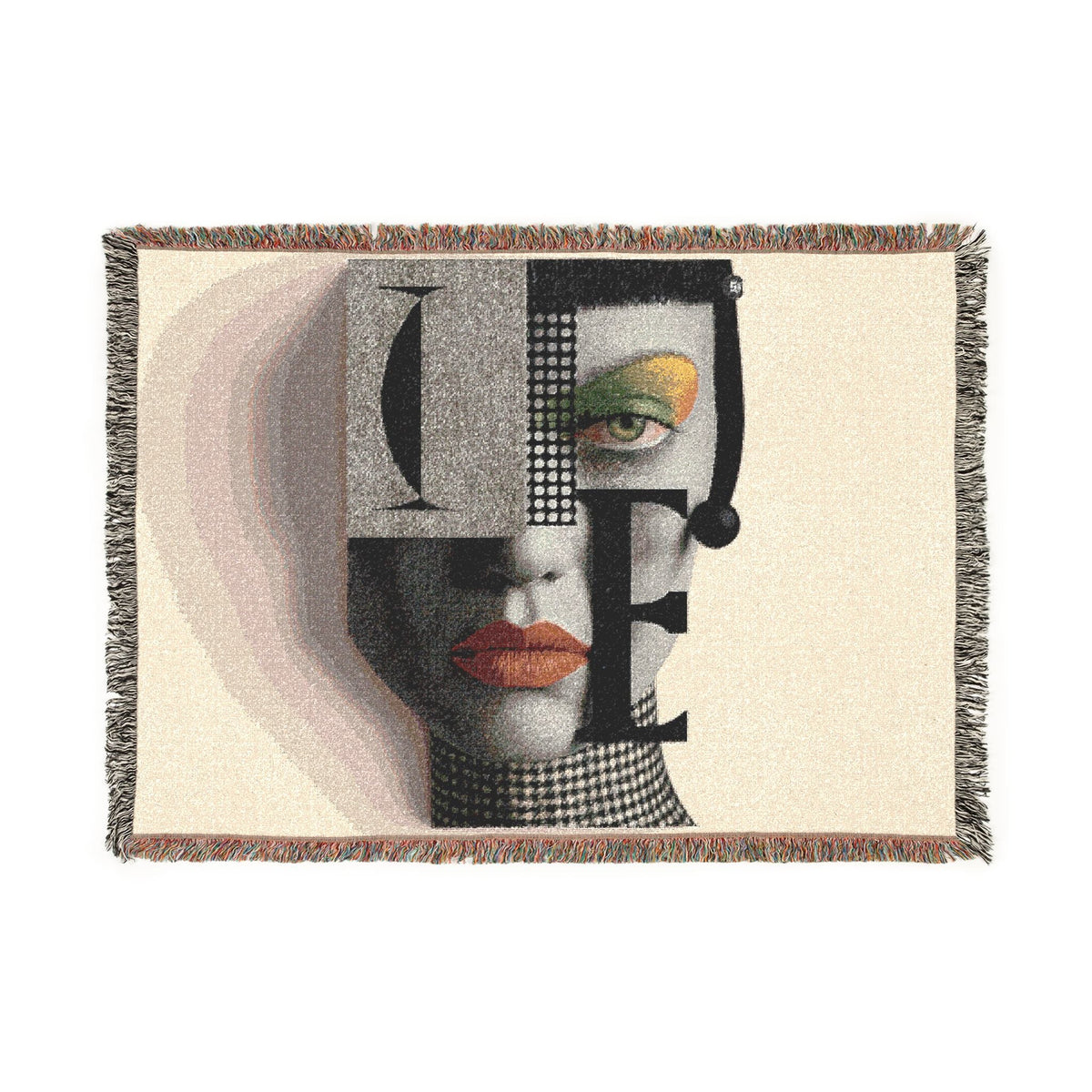 PURETE woven cotton throw blanket featuring a bold abstract portrait with geometric shapes and fringed edges.