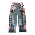 PURETE women's pajama pants featuring a vibrant artistic print of a figure with white flowers in brushed polyester.