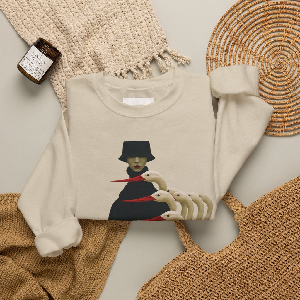 PURETE beige crewneck sweatshirt featuring a surreal graphic of a cloaked figure with white birds on a neutral background