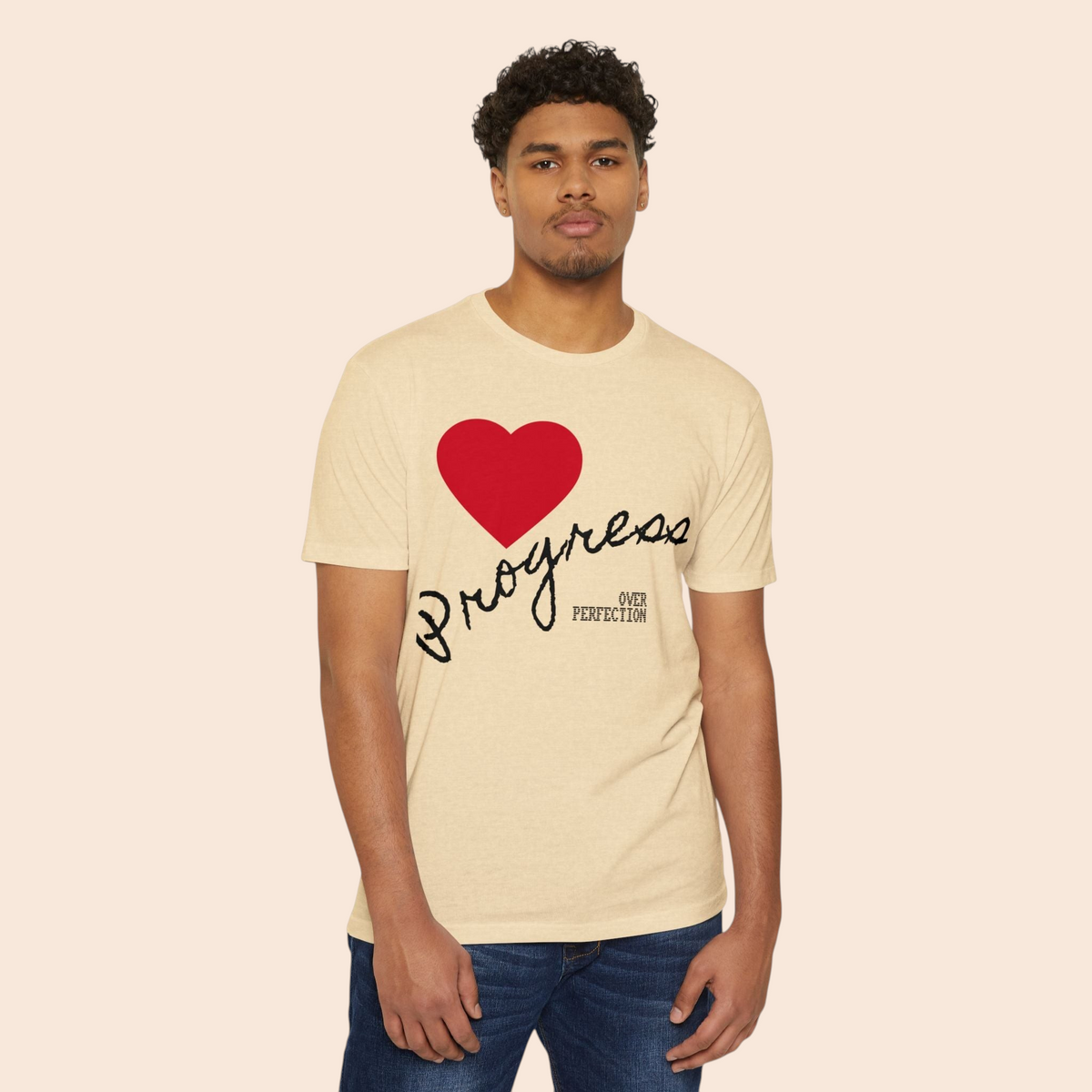 PURETE beige cotton blend t-shirt featuring a red heart and Progress Over Perfection graphic on a male model