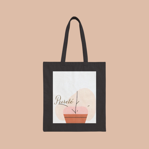 PURETE black cotton canvas tote bag with a minimalist potted plant graphic print and long shoulder handles.
