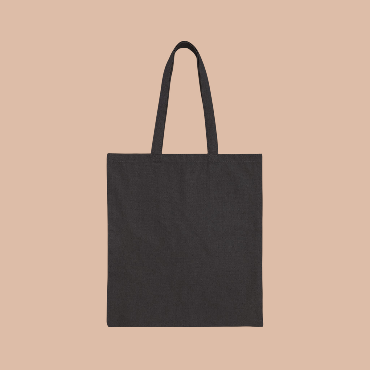 PURETE black cotton canvas tote bag with durable handles for everyday shopping and carrying essentials.