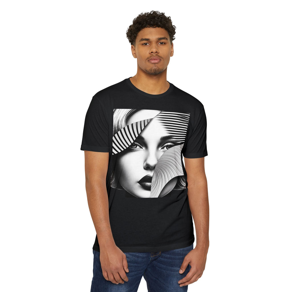 A man wearing a PURETE black unisex CVC jersey t-shirt featuring a graphic print of a woman's face with striped art.