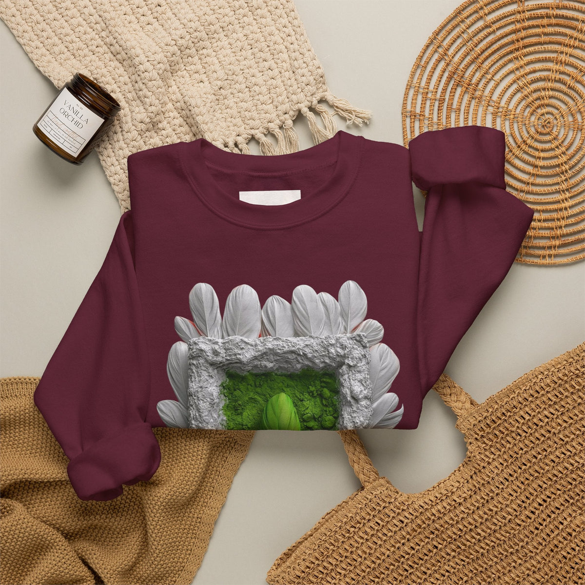 PURETE maroon crewneck sweatshirt featuring a green portal art design with white feathered frame on a neutral background.