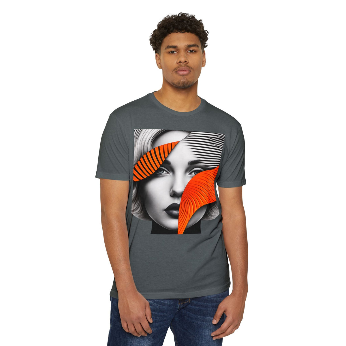 A man wearing a PURETE dark grey CVC jersey t-shirt with a graphic print of a woman's face and orange abstract shapes.