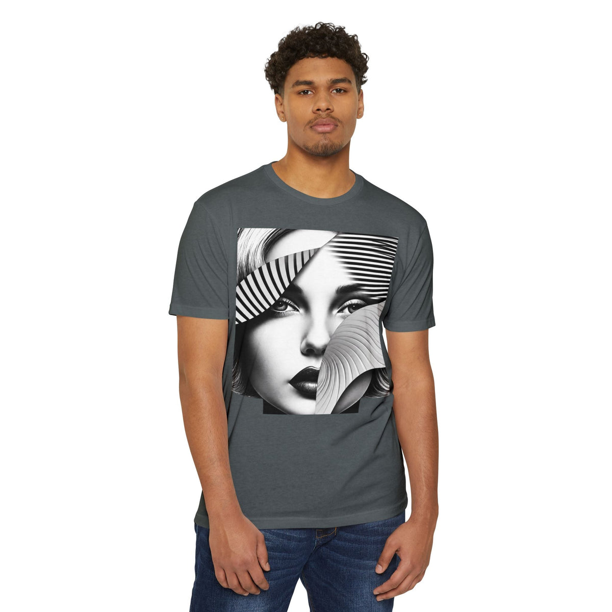 A man wearing a PURETE charcoal grey CVC jersey t-shirt with a black and white abstract face graphic print.
