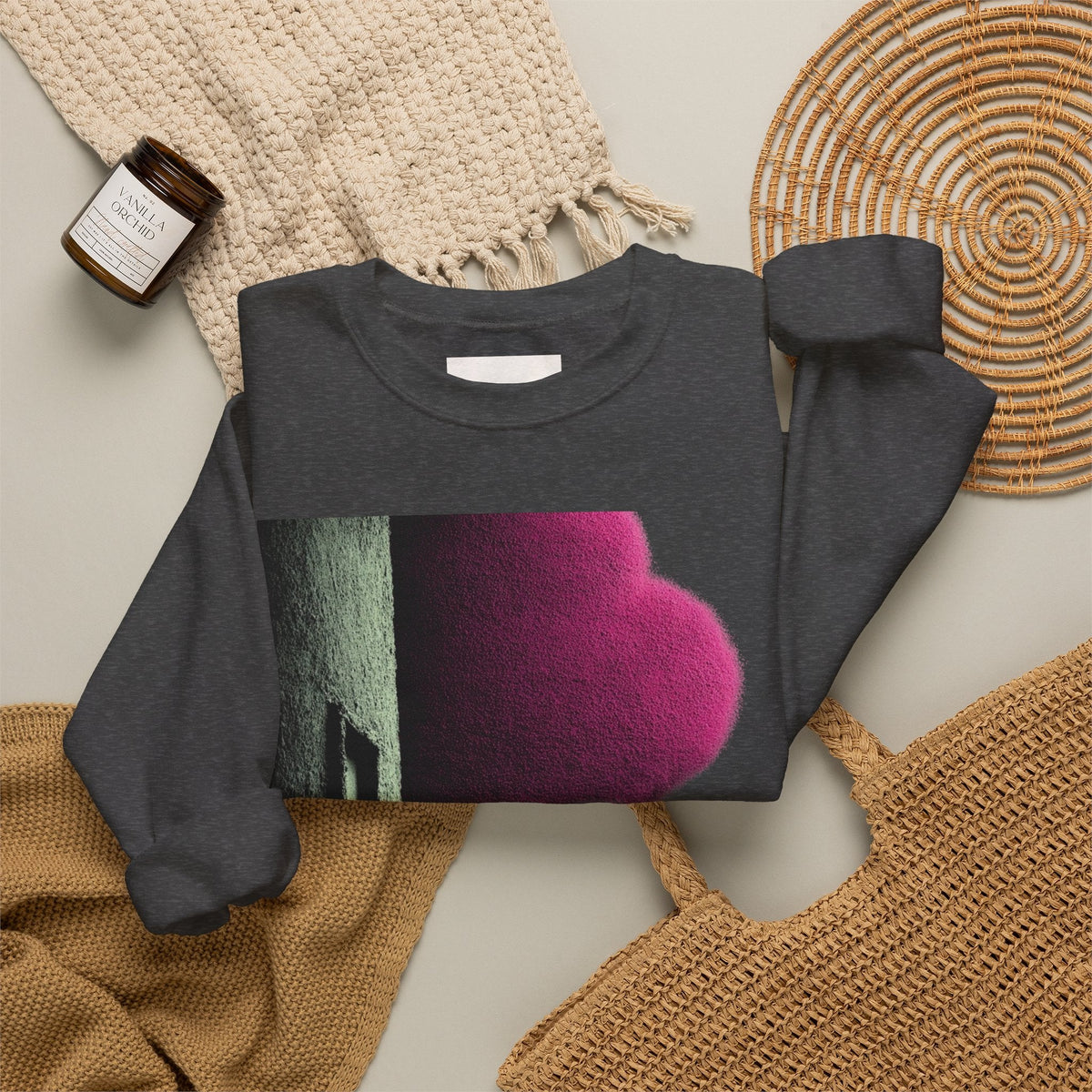 PURETE charcoal grey crewneck sweatshirt with a vibrant pink and green abstract graphic print on a neutral background.
