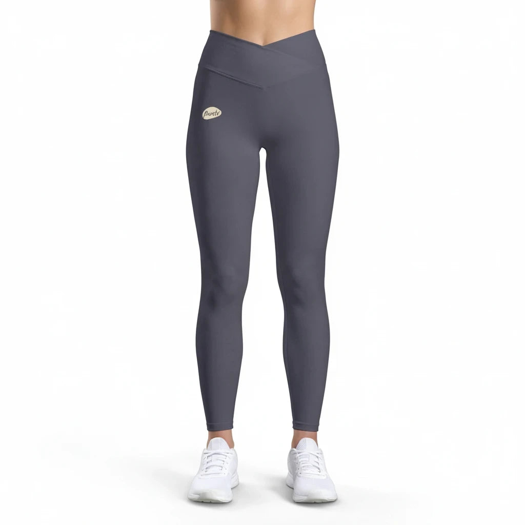 PURETE high-waist charcoal grey yoga leggings with a V-cut waistband and subtle logo on the hip.