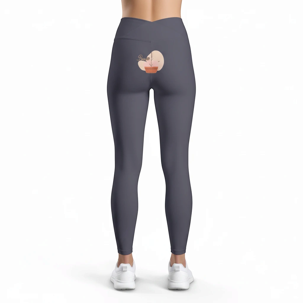 PURETE high-rise yoga leggings in dark grey with a small floral heart graphic on the back hip.