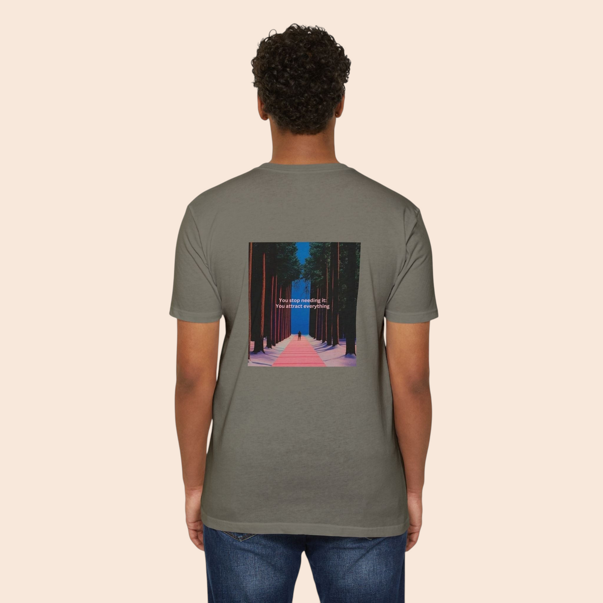 PURETE grey cotton t-shirt featuring a back graphic of a forest pathway with the quote You attract everything