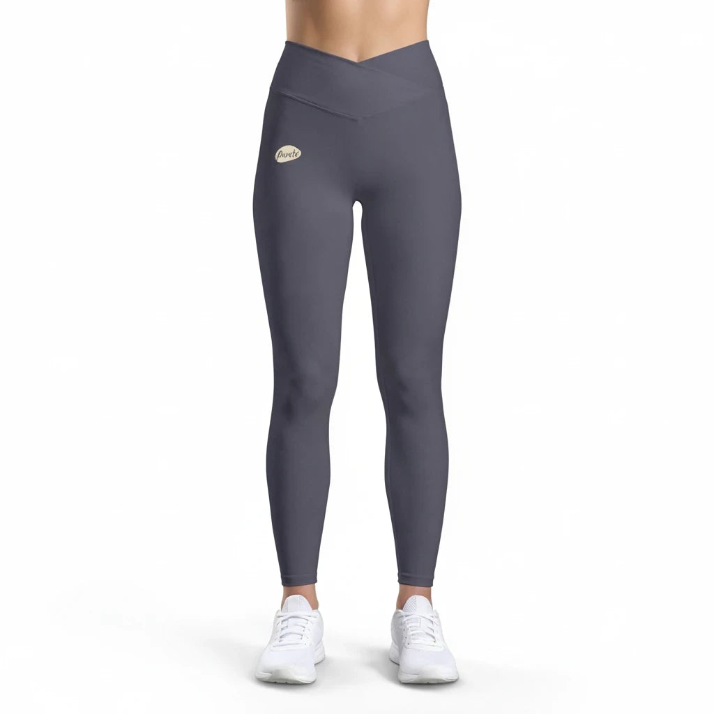 PURETE high-waist yoga leggings in dark grey with a v-cut waistband and subtle logo on the hip