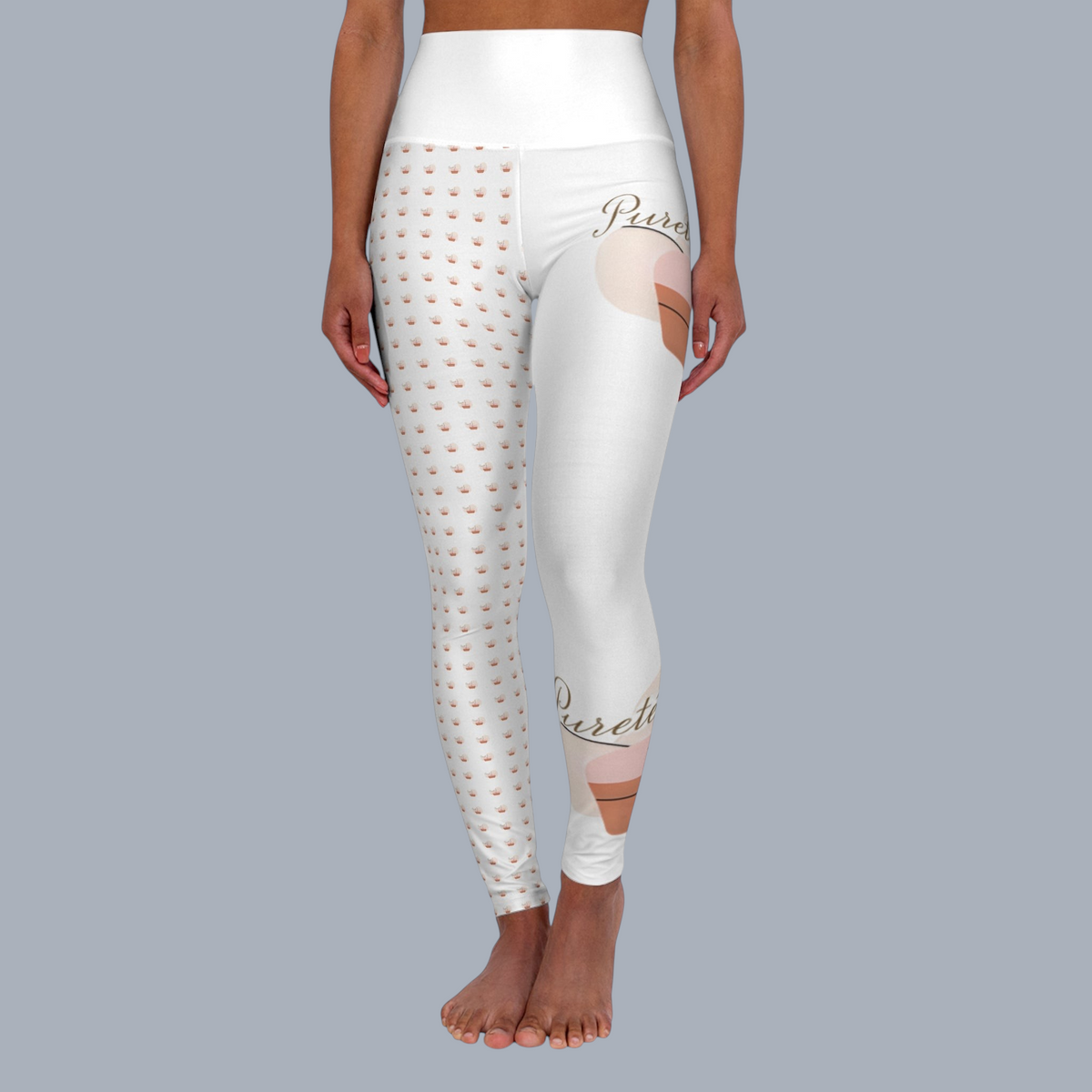 PURETE high-waisted yoga leggings with a white base, small crown pattern, and abstract peach-toned graphic print.