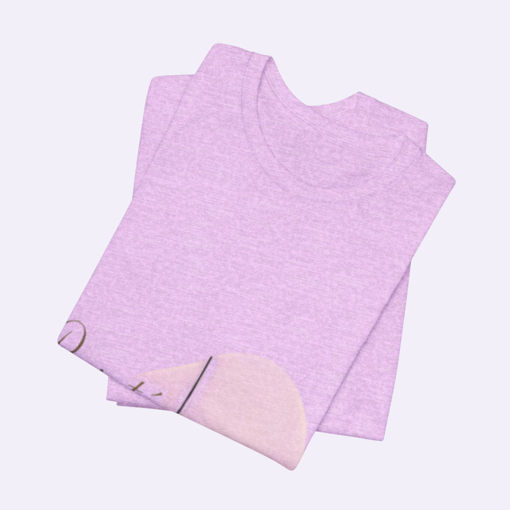 PURETE unisex jersey short sleeve tee in soft light pink cotton with a crew neckline, folded for a neat display.