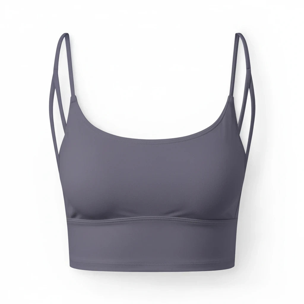 PURETE Luxe Crop Bra in dark grey with slim double straps and a smooth, second-skin recycled nylon fabric finish.