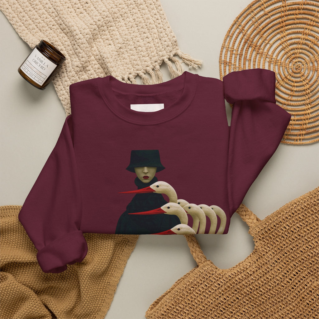 PURETE maroon crewneck sweatshirt featuring a surreal graphic of a cloaked figure with white bird heads