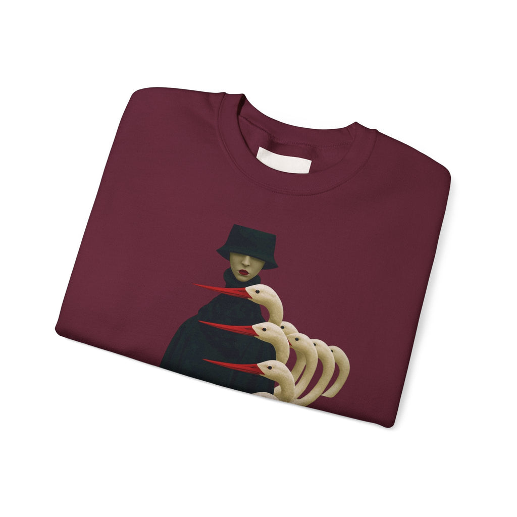 PURETE maroon crewneck sweatshirt featuring a surreal graphic of a cloaked figure with multiple bird-like heads.