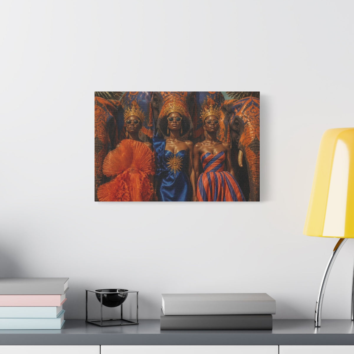 PURETE matte canvas print featuring three regal women in crowns and vibrant dresses with elephants on a white wall