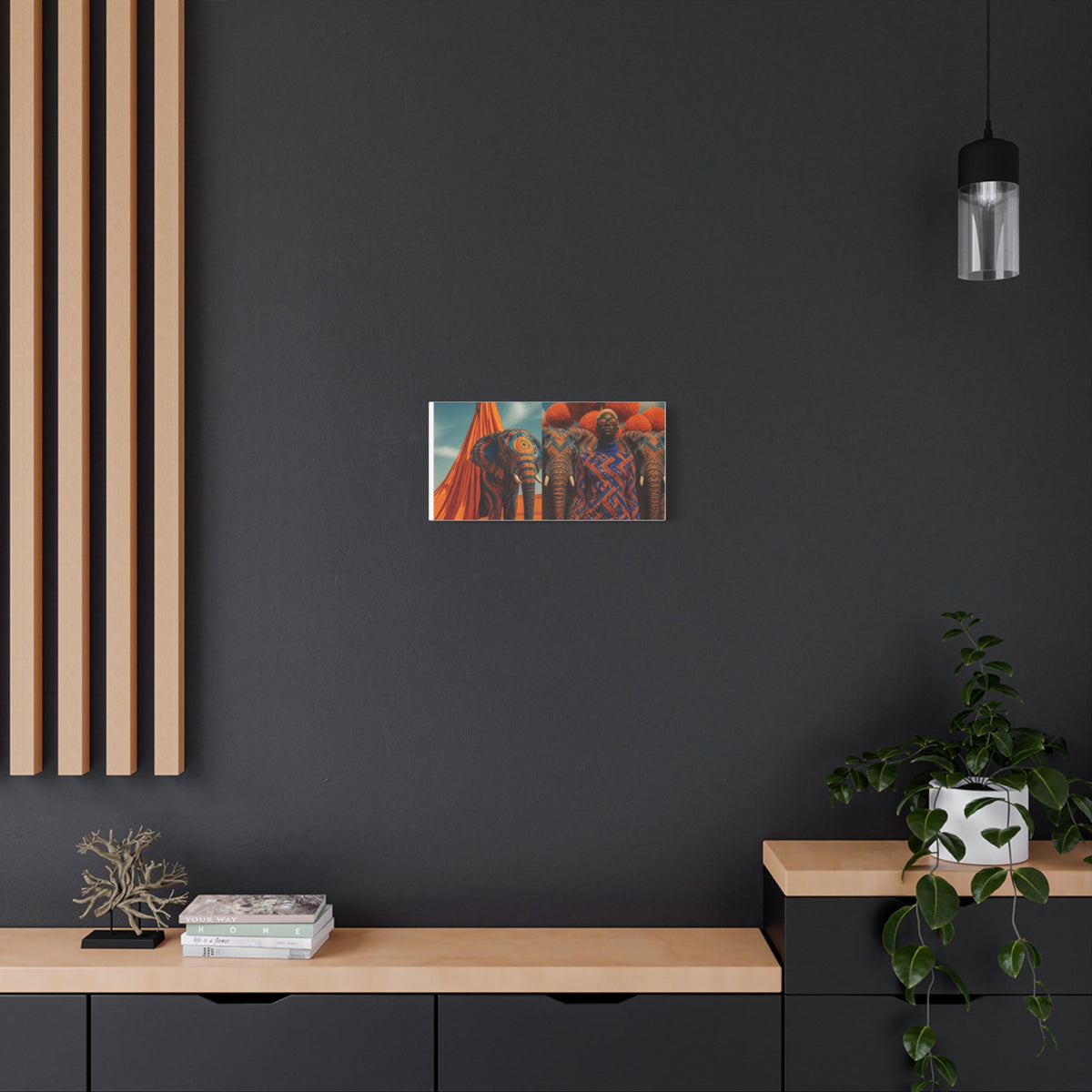 PURETE matte canvas featuring vibrant elephant artwork hanging on a dark grey wall above a wooden console table.
