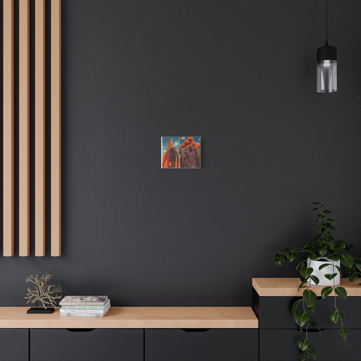 PURETE matte canvas print featuring an elephant procession on a dark grey wall above a modern wooden console table.