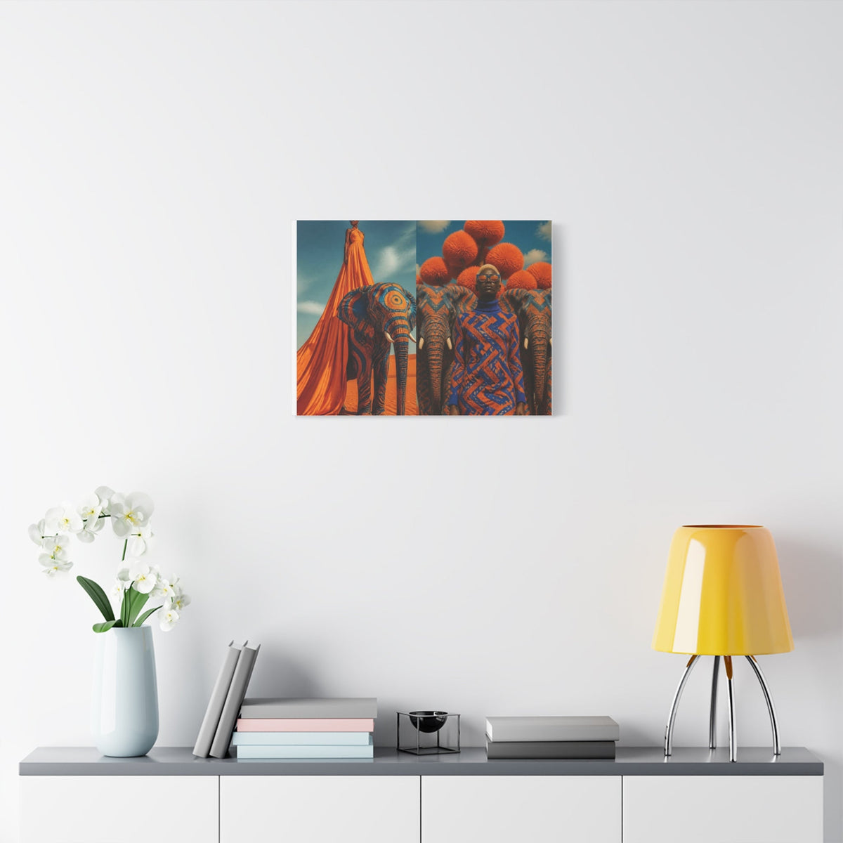 PURETE matte canvas print featuring vibrant elephant and portrait art hanging on a clean white wall above a console.