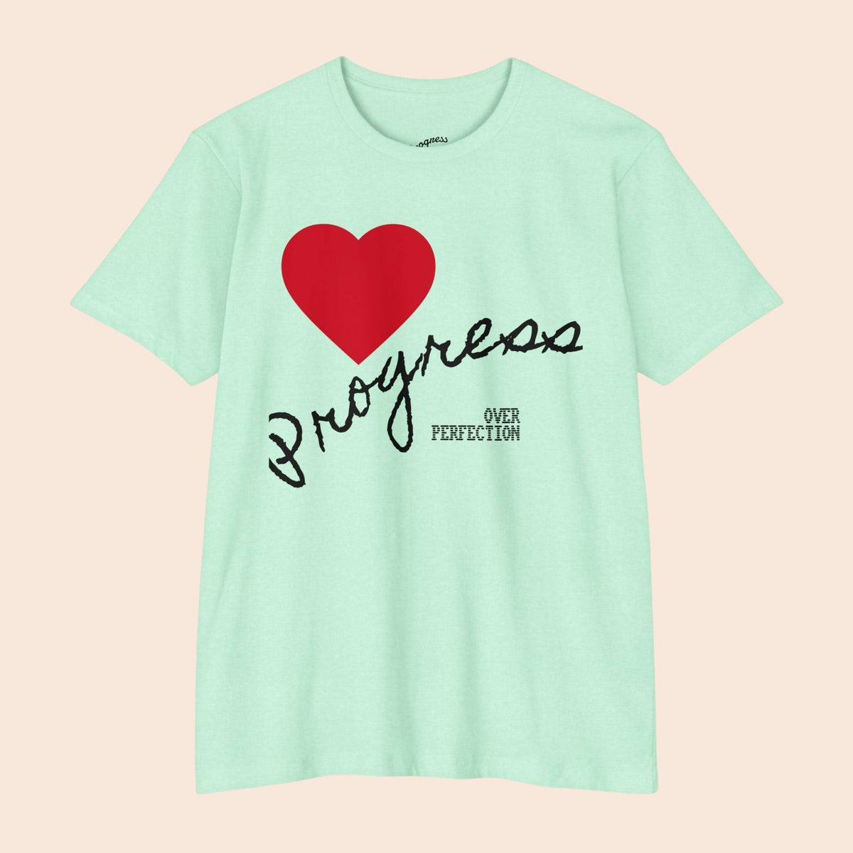 PURETE mint green cotton blend t-shirt featuring a red heart and Progress Over Perfection graphic on the front