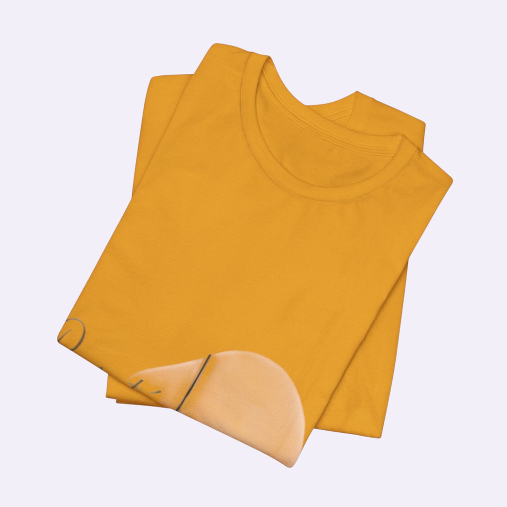 PURETE unisex jersey short sleeve tee in mustard yellow, folded neatly to show crew neckline and soft cotton fabric.