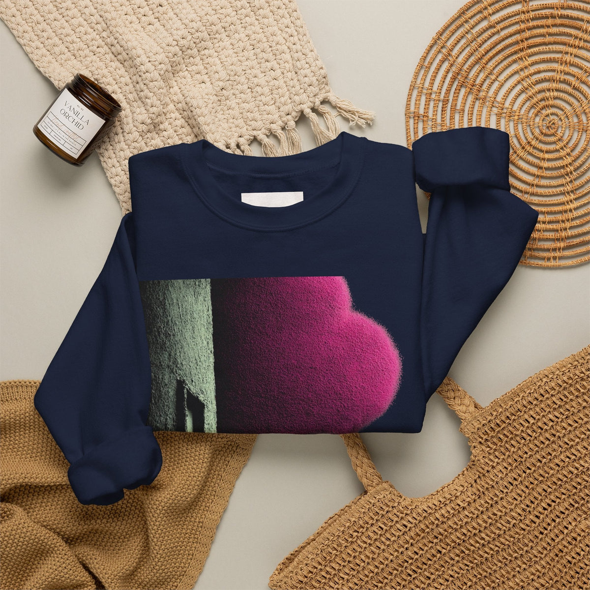 PURETE navy blue crewneck sweatshirt with a vibrant pink and green abstract graphic print on a neutral background.