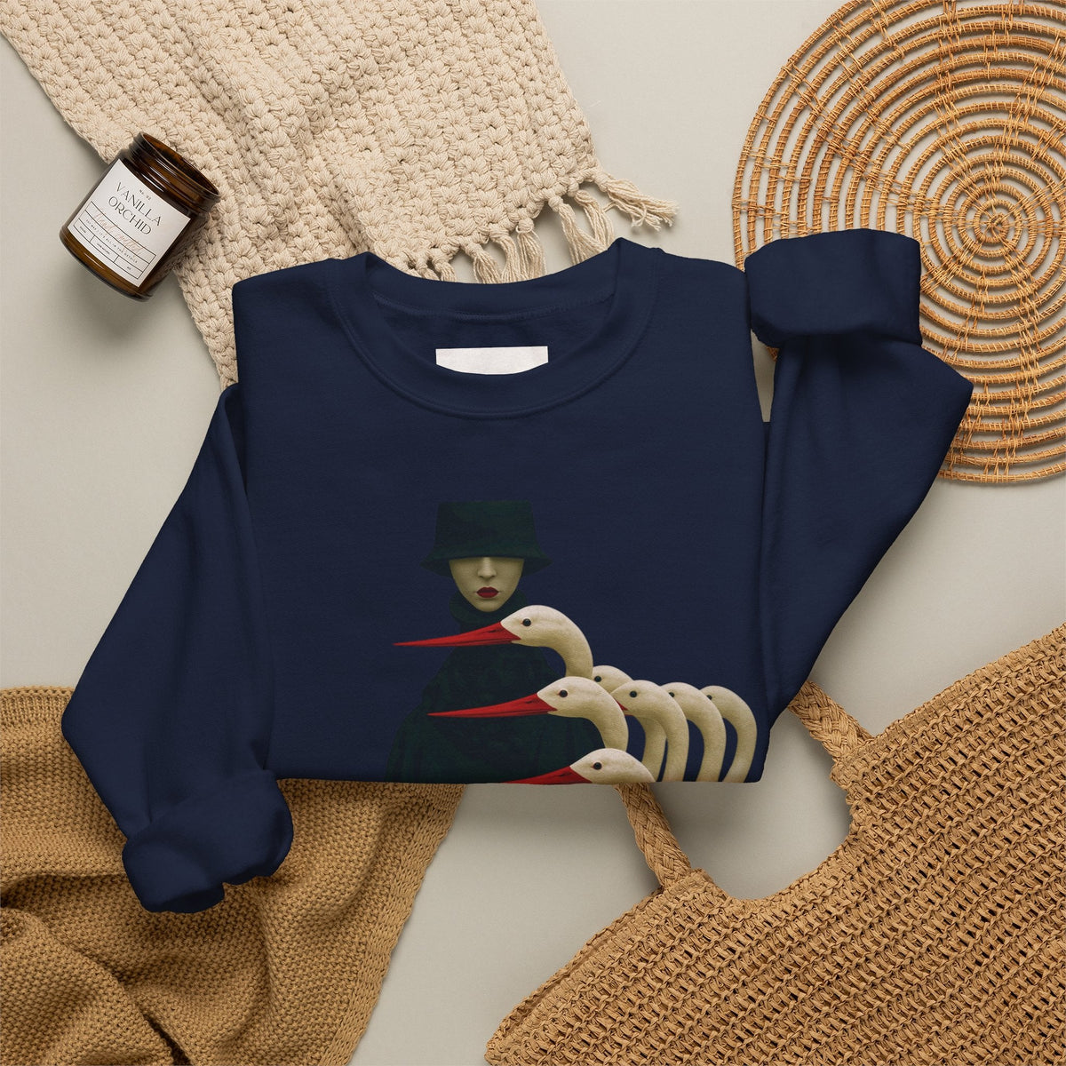 PURETE navy blue crewneck sweatshirt featuring a surreal graphic of a figure with multiple bird-like heads