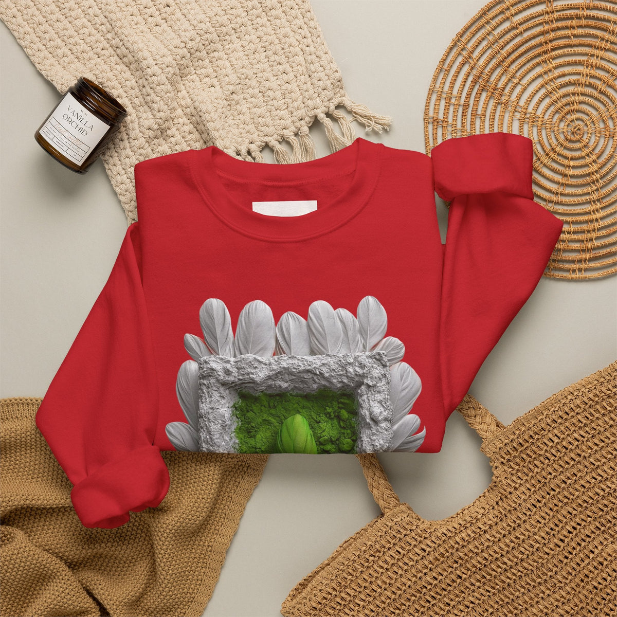 PURETE red crewneck sweatshirt featuring a white feathered frame around a green portal design, laid flat on a neutral background.