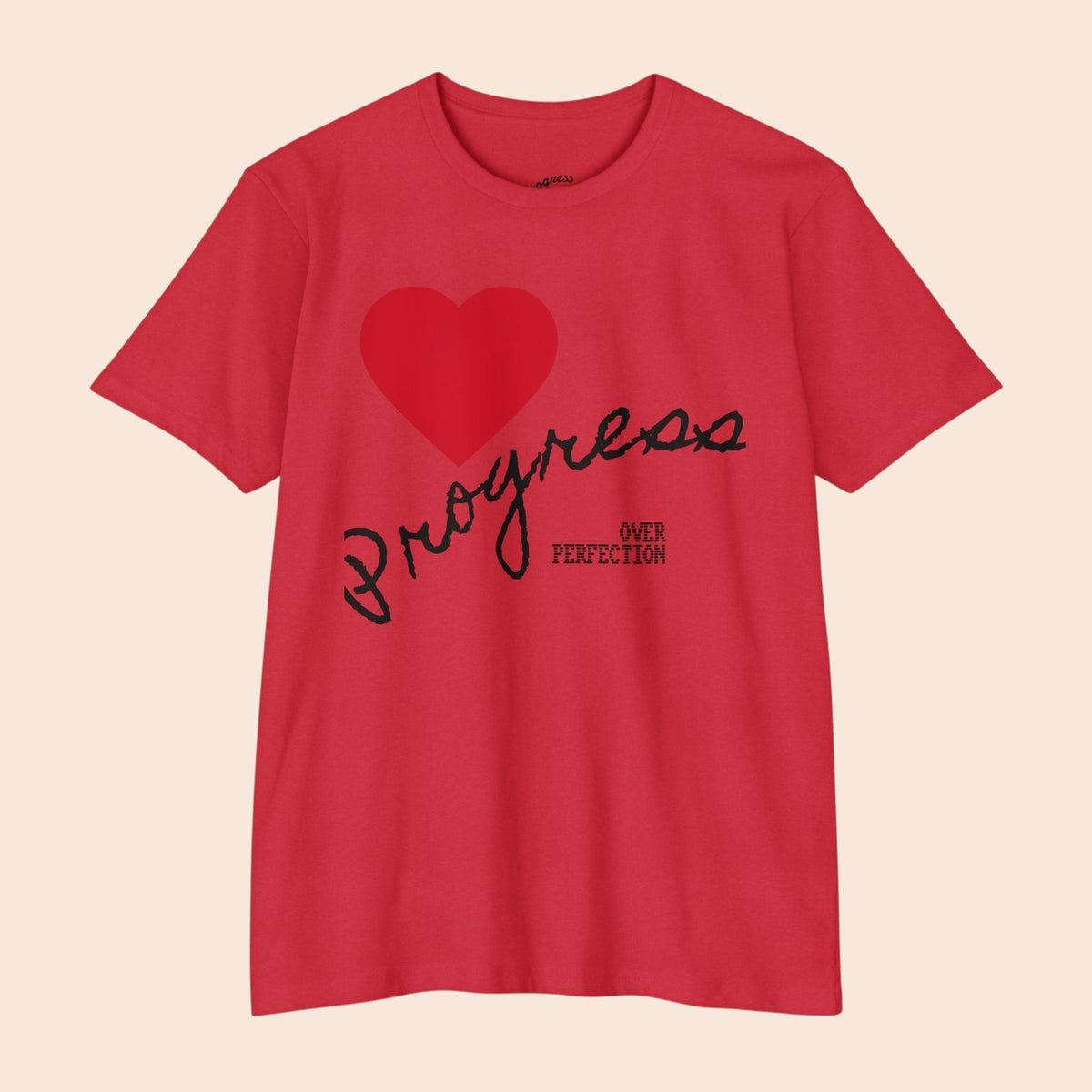 PURETE red cotton blend t-shirt featuring a heart graphic and hand-lettered Progress Over Perfection text