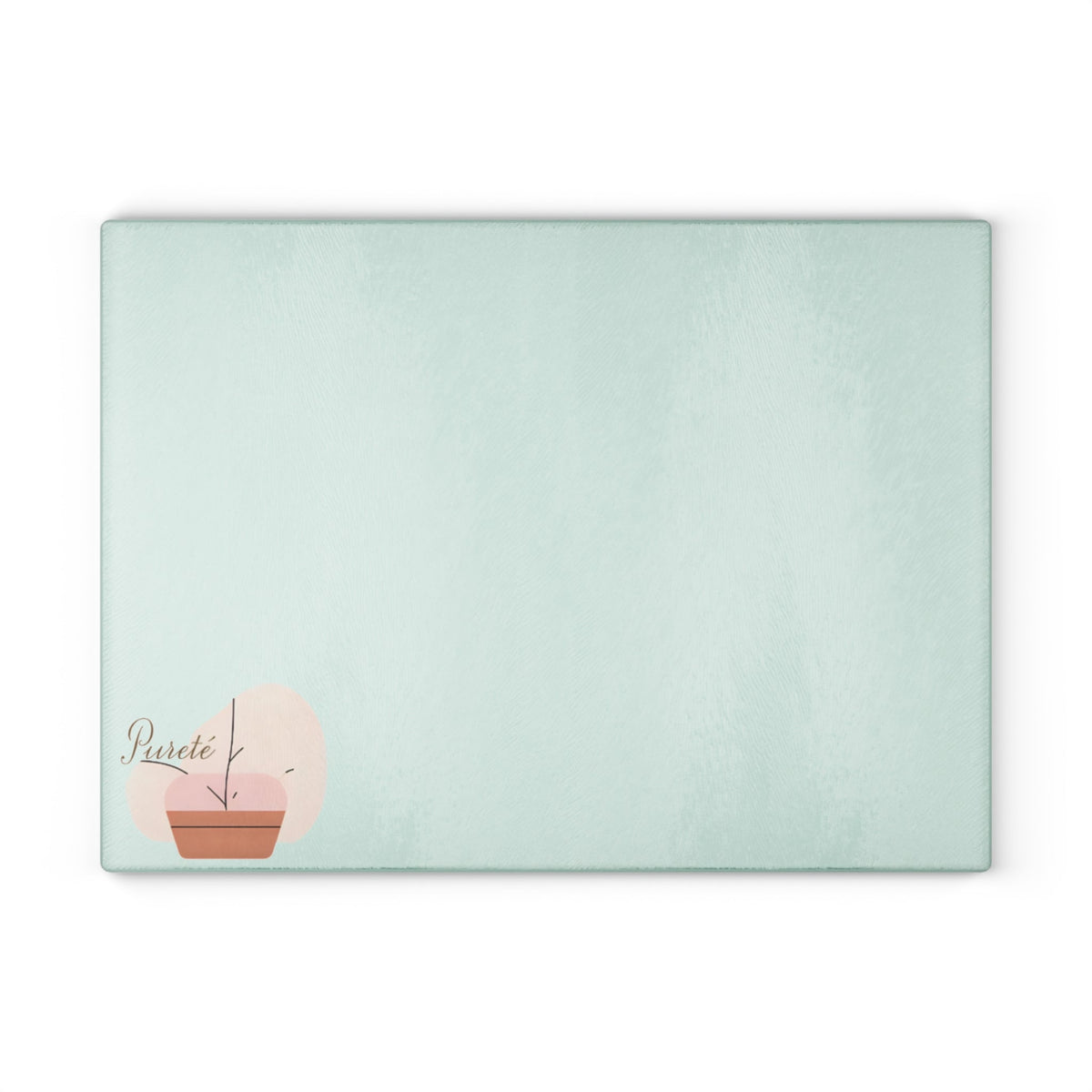 PURETE tempered glass cutting board in light sage green with a minimalist potted plant graphic in the corner