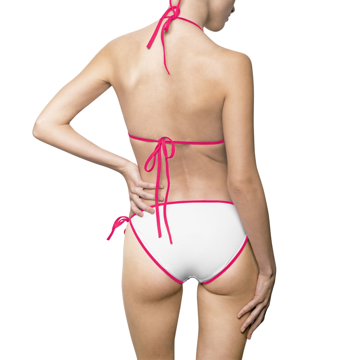 Back view of a woman wearing a PURETE white bikini with vibrant pink trim and adjustable tie straps