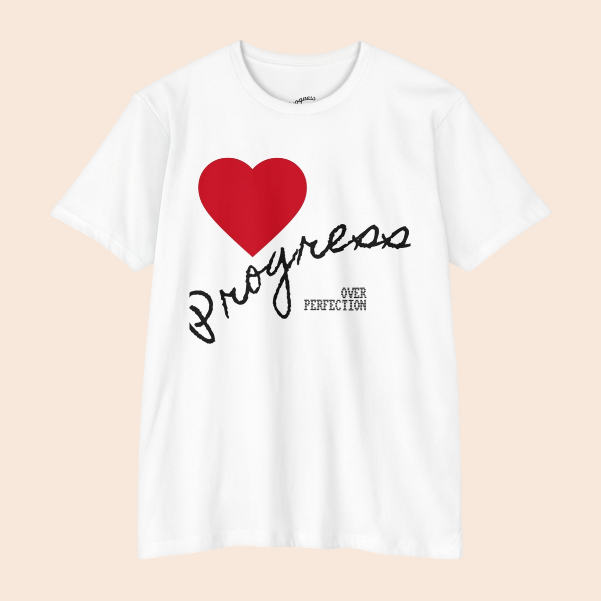 PURETE white cotton blend t-shirt featuring a red heart and hand-lettered Progress Over Perfection graphic