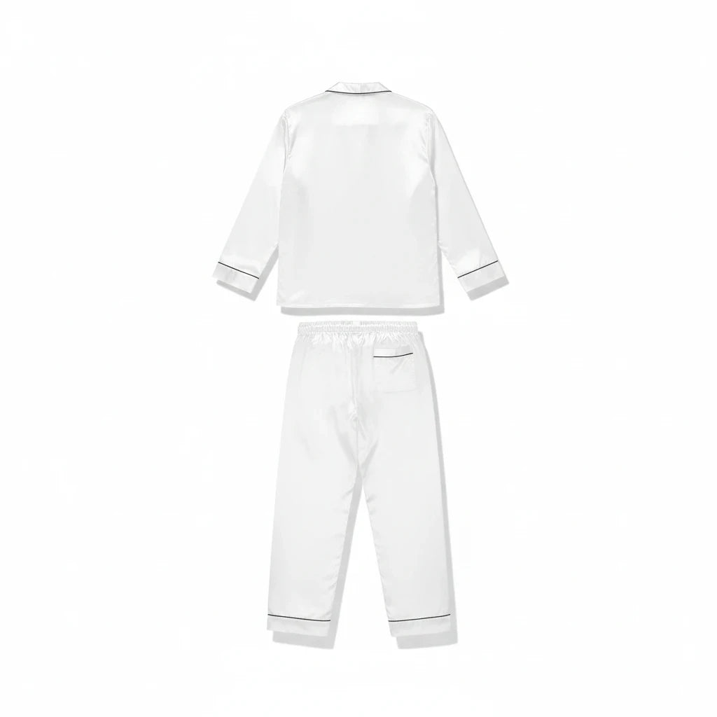 PURETE women's white satin pajama set with long sleeves, notch lapel, and black trim details on a white background.