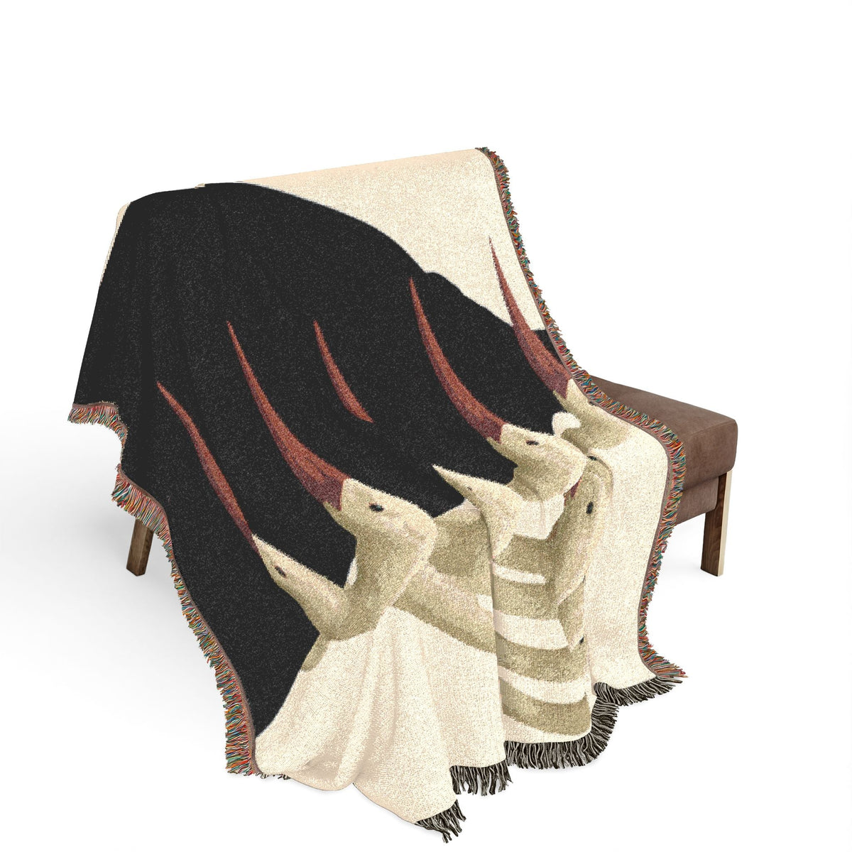 PURETE woven cotton throw blanket featuring a black and beige abstract graphic design with colorful fringed edges.
