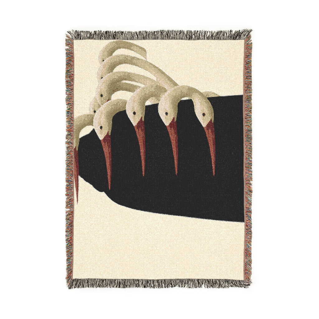 PURETE woven cotton throw blanket featuring a graphic art print of white birds with red beaks on a black background.
