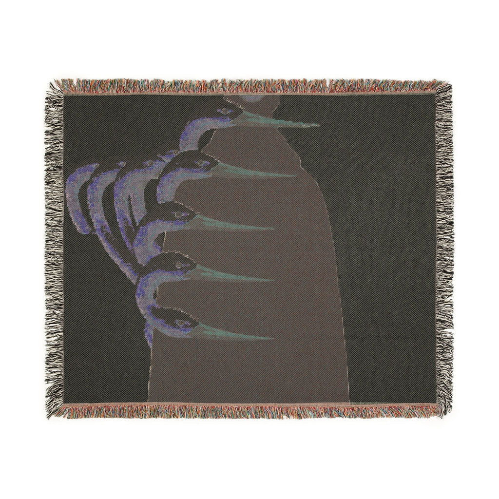 PURETE woven cotton throw blanket featuring dark abstract graphic art and colorful fringed edges.