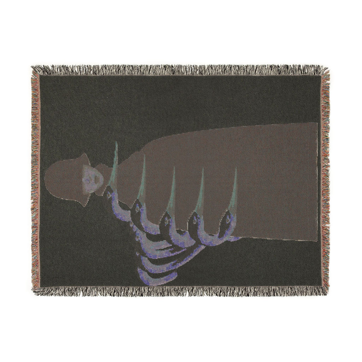 PURETE woven cotton throw blanket featuring a dark artistic graphic with colorful fringed edges.