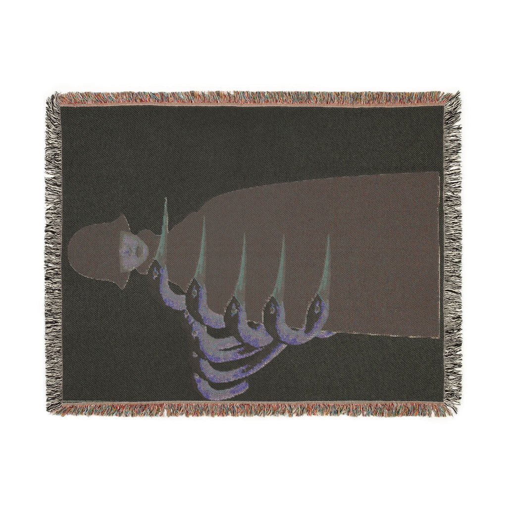 PURETE woven cotton throw blanket featuring a dark graphic design of a hand with long fingers and colorful fringe